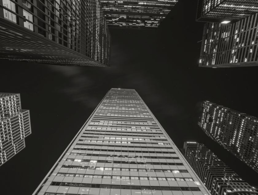 Black and white image of Toronto buildings looking up into the sky
